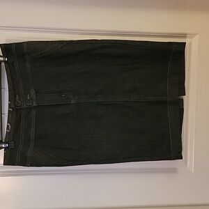 Dark Stretch Denim Skirt with Pockets and vent back.